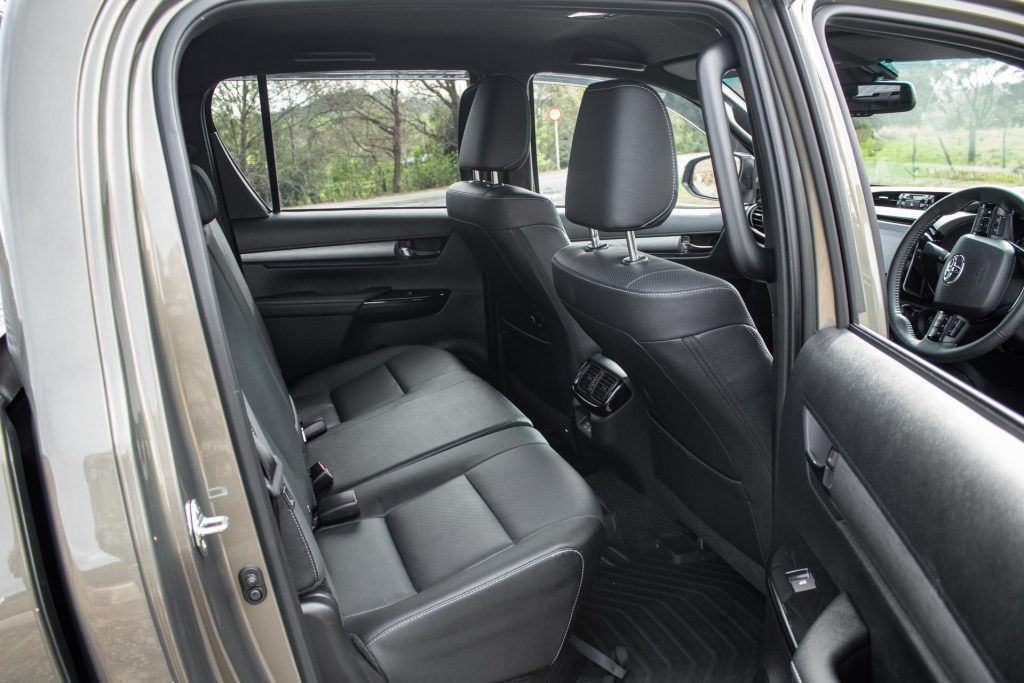 Rear interior view of the 2024 Toyota Hilux SR5 Cruiser Hybrid seat space