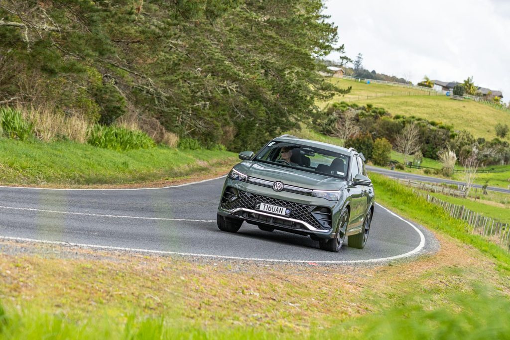 Volkswagen Tiguan R-Line in green, taking a corner