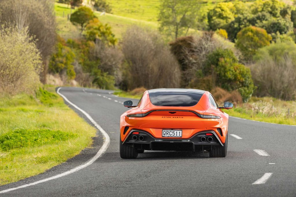 Rear view of Aston cornering