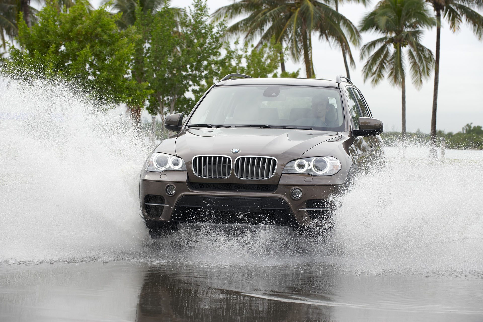 Second-gen X5 doing its thing through water.