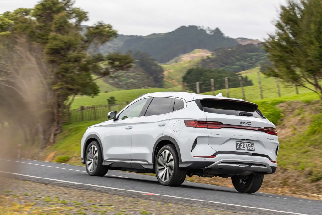 BYD Sealion 6 flyby, shown from the rear. In white