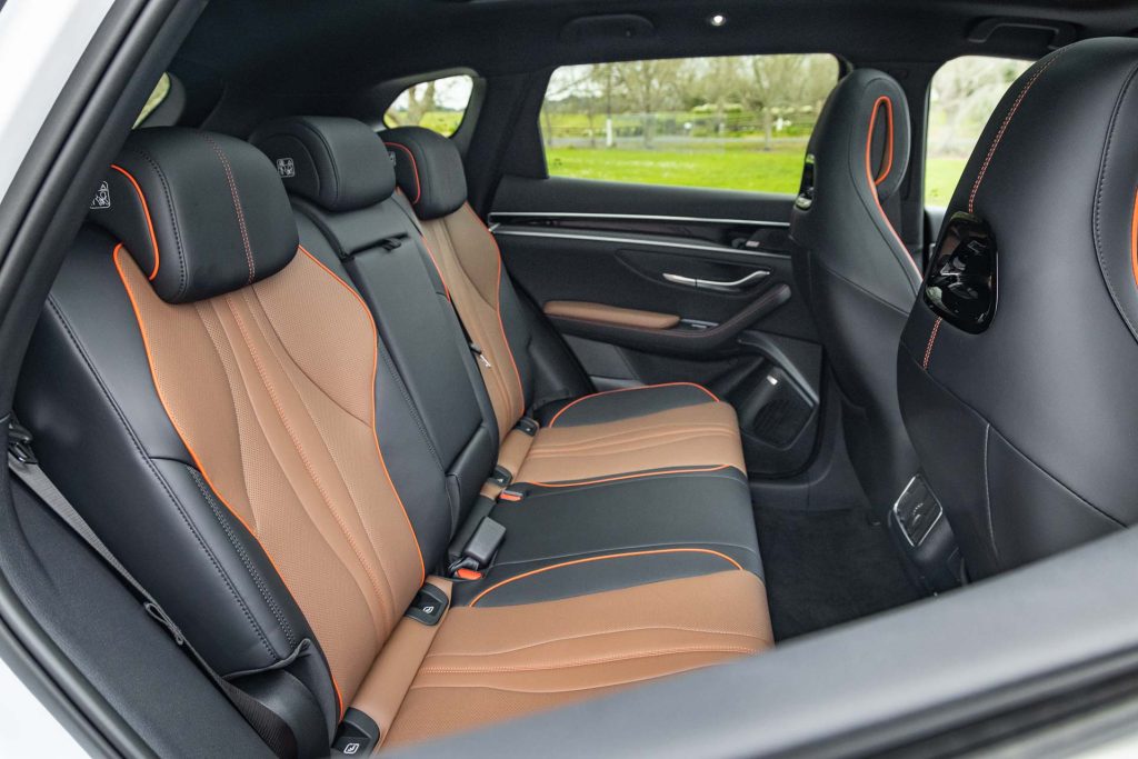 Rear seat space, and orange accented seat design