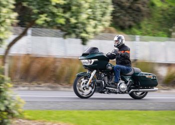 Harley Davidson Road Glide front panning shot, pictured in dark green