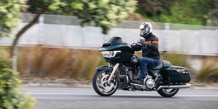 Harley Davidson Road Glide front panning shot, pictured in dark green