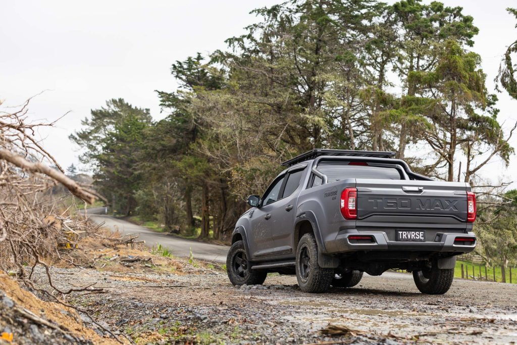 Rear quarter of ute parked in mud and gravel