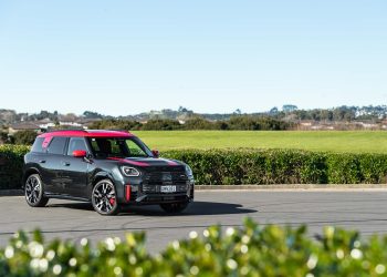 Mini Countryman JCW All4 Flavoured model in black and red. Parked in a park