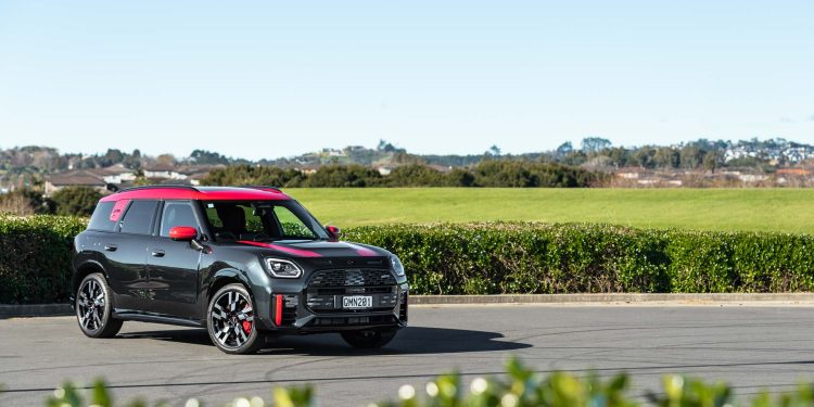 Mini Countryman JCW All4 Flavoured model in black and red. Parked in a park