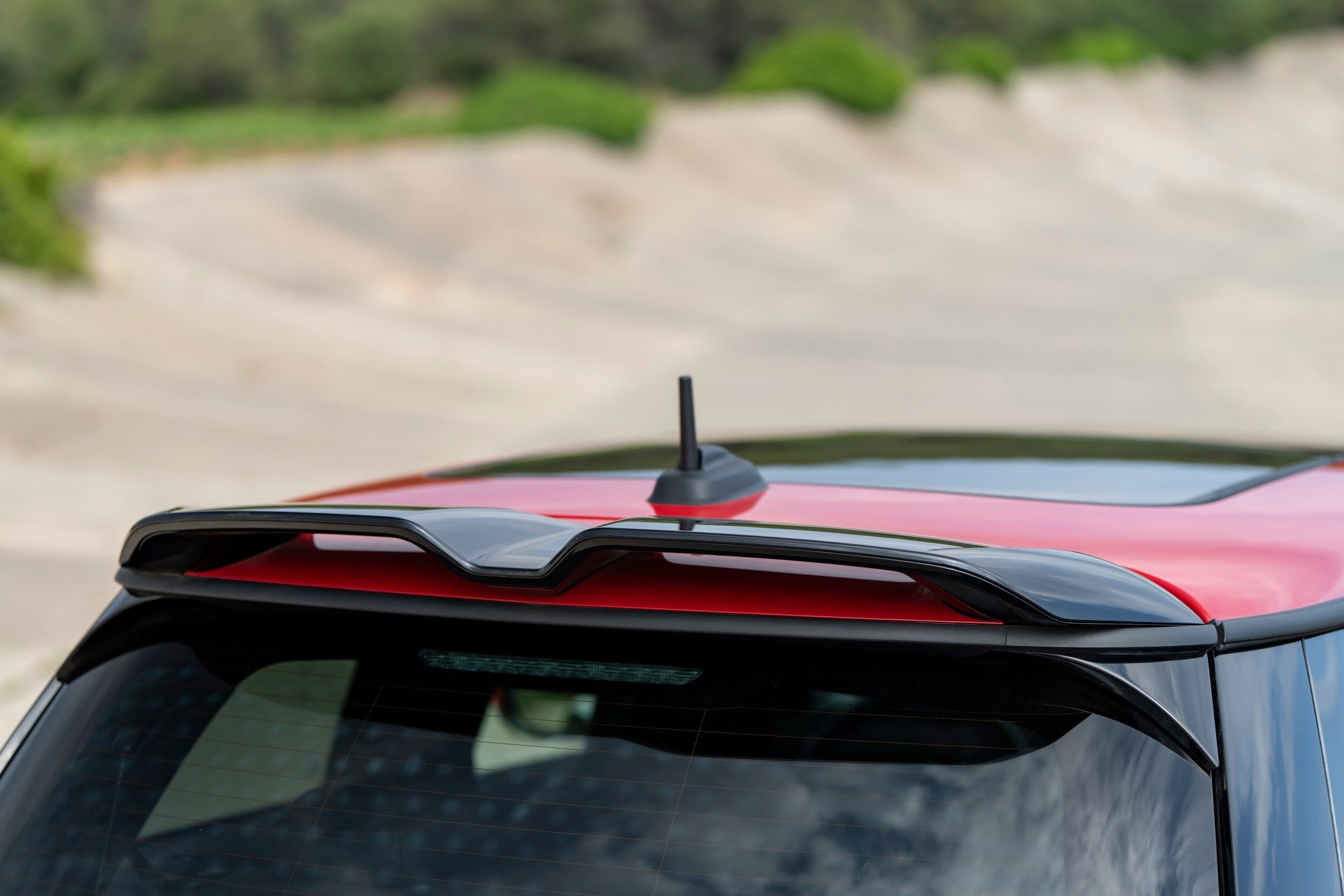 The wee roof-end spoiler is another JCW giveaway.