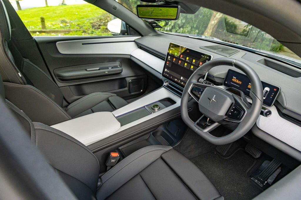 Interior view showing steering wheel and dash layout