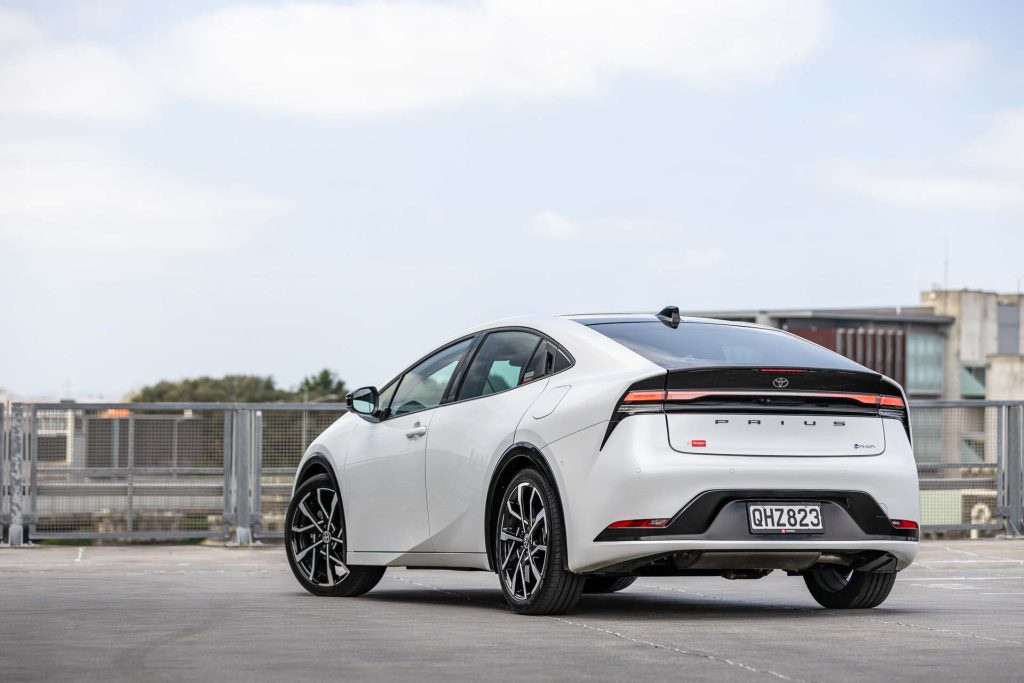 2024 Toyota Prius PHEV in white, rear shot pictured on a rooftop