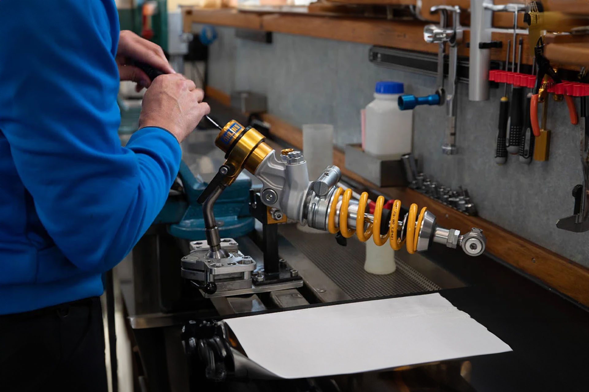 Here is an Ohlins shock being tweaked by a technician.