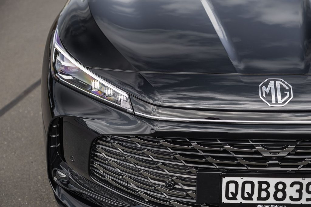 Front grille and headlight detail shot of Black MG