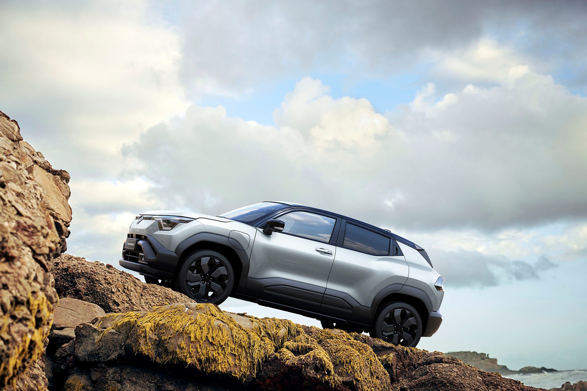 A silver coloured e Vitara on the ascent.