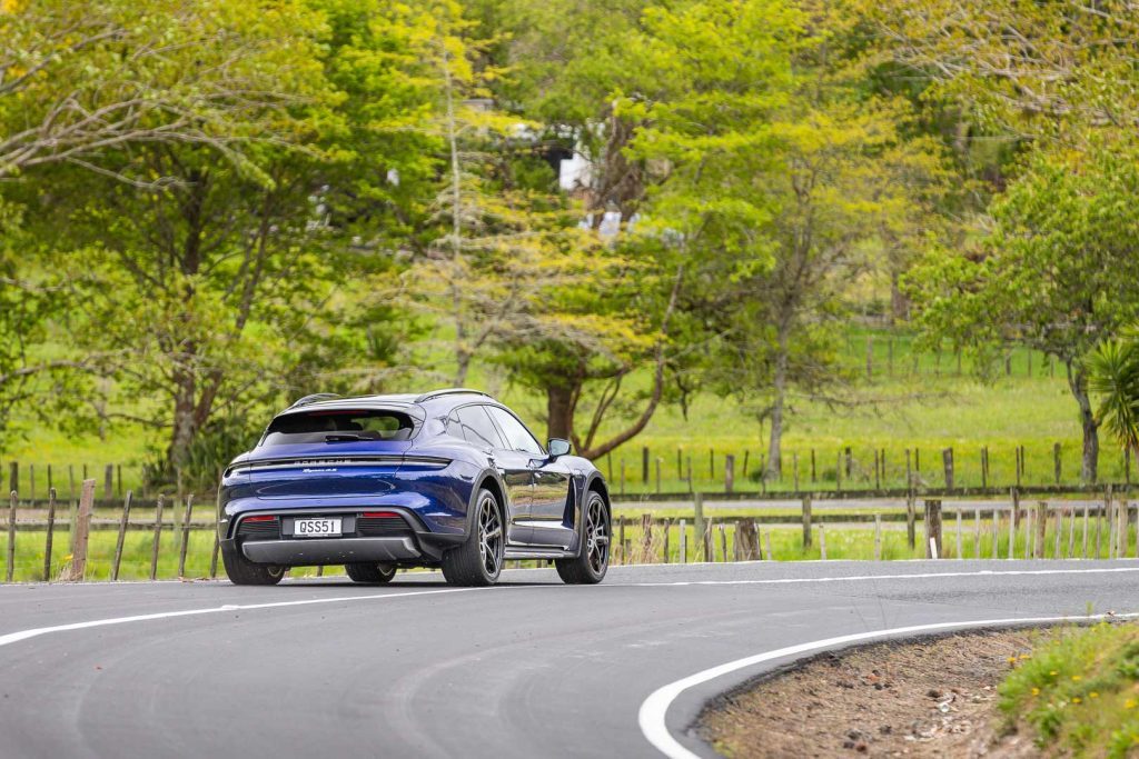 Rear view of the Porsche Taycan 4S shooting brake while cornering