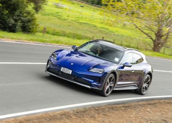 Porsche Taycan 4S Cross Turismo shooting brake, taking a corner at pace