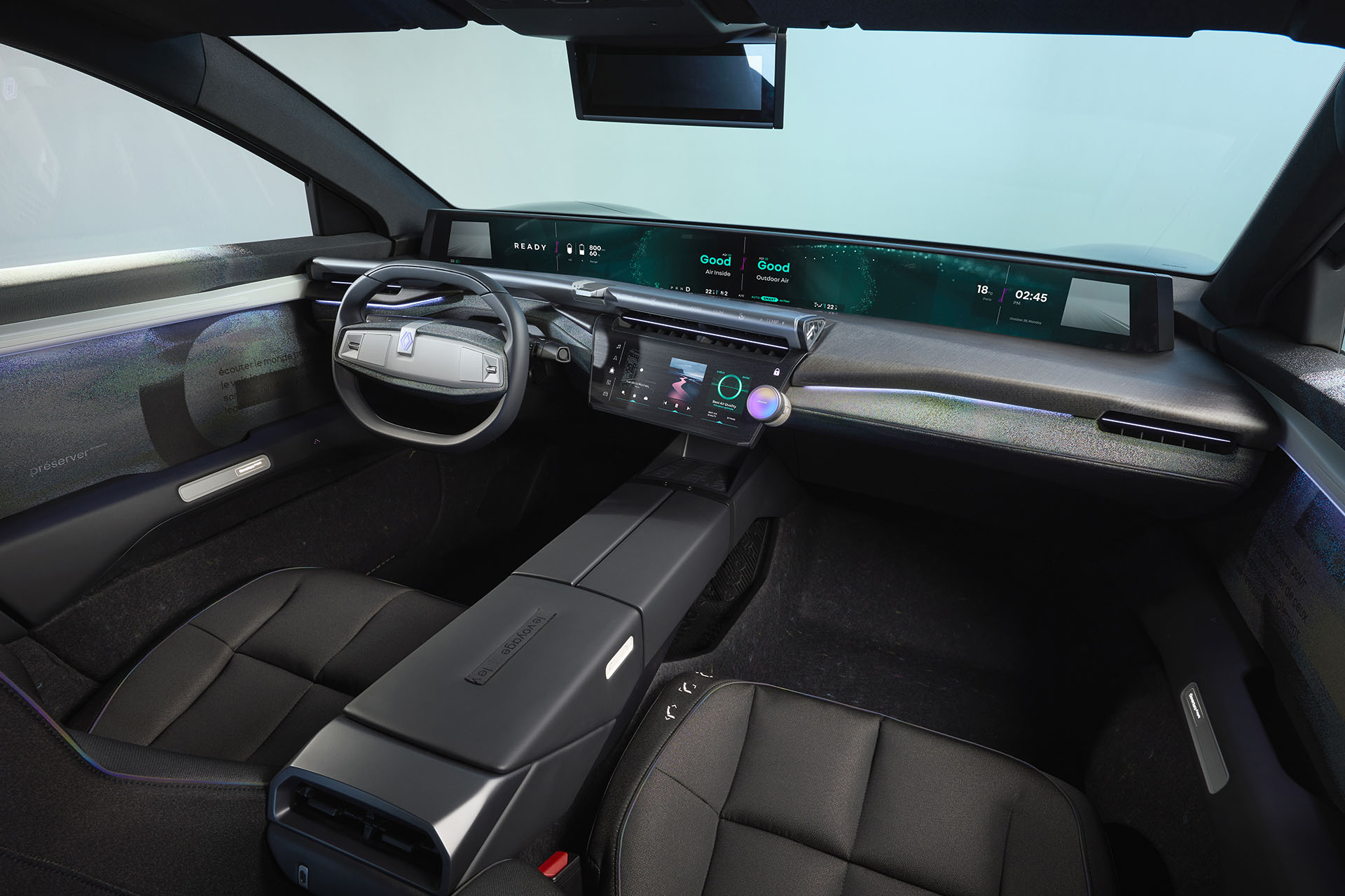 Interior features minimalist style, full-width touchscreen.