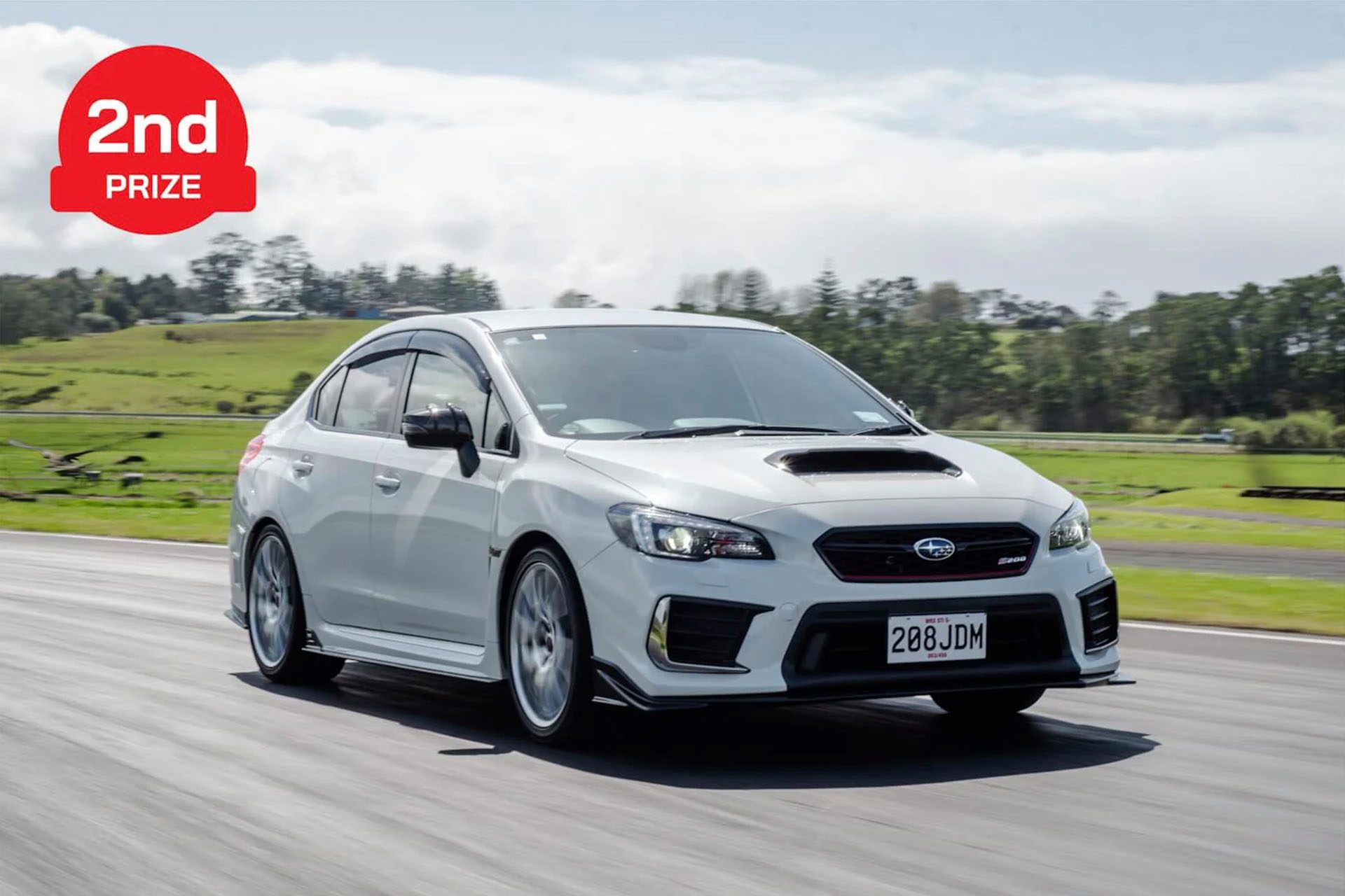 Second prize is a rare WRX STI S208 variant.