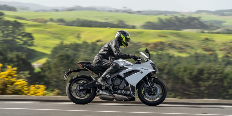 Triumph Daytona 660 panning side profile shot, while moving at pace