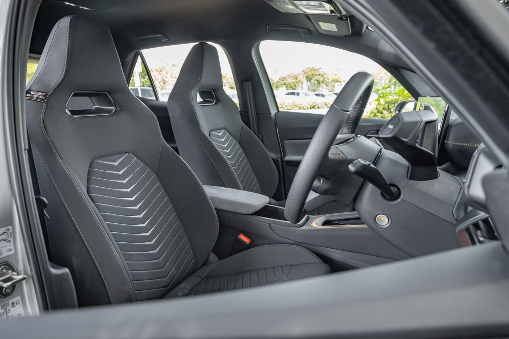 Cupra Born front seat space, with V shape design on seats