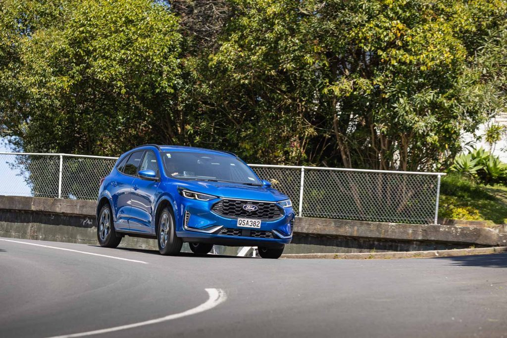 Blue Ford Escape front shot, pictured cornering