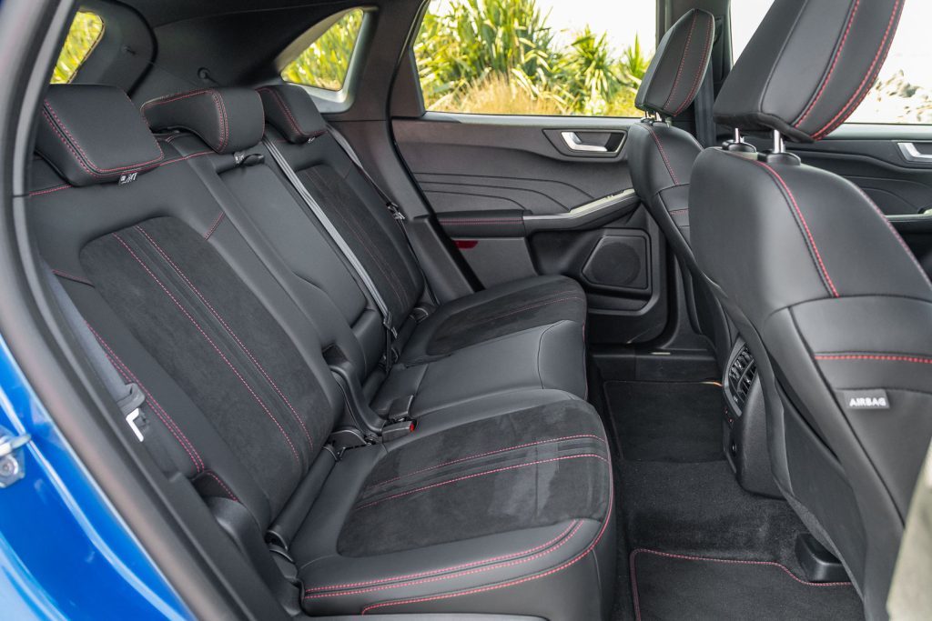 Rear seat space inside the Kia Sportage HEV