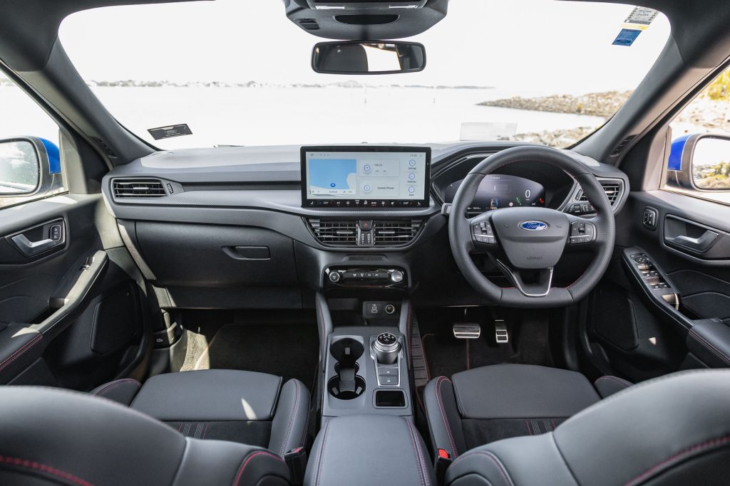 Ford Escape FHEV interior space, wide shot showing full dash layout