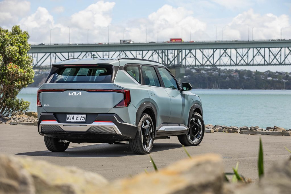 2024 Kia EV5 Light+ rear quarter view Auckland harbour bridge