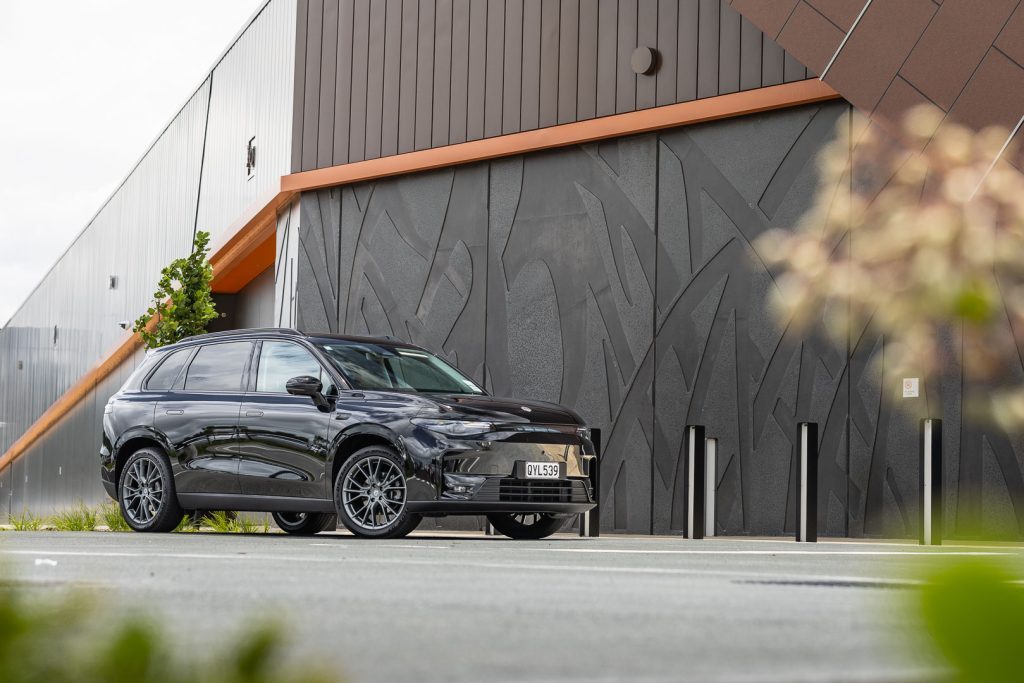 Front quarter shot of the 2024 Leapmotor C10 pictured in black. In front of Auckland mall