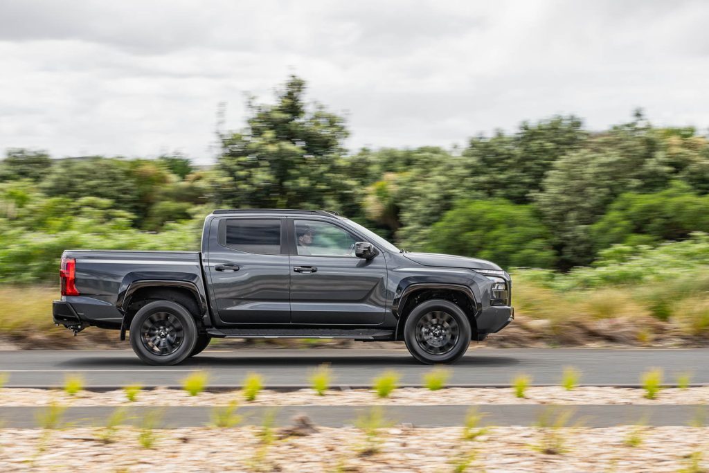 Panning motion shot of the 2024 Mitsubishi Triton VRX 4X4