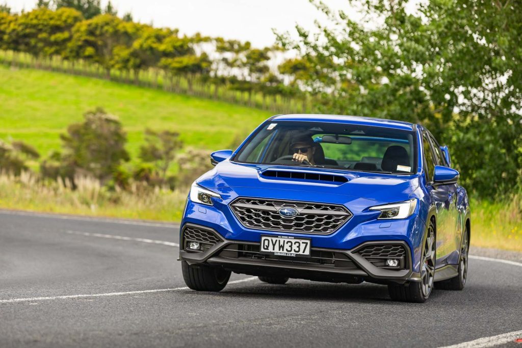 cornering in the 2024 Subaru WRX Todoroki, pictured in blue, close up shot