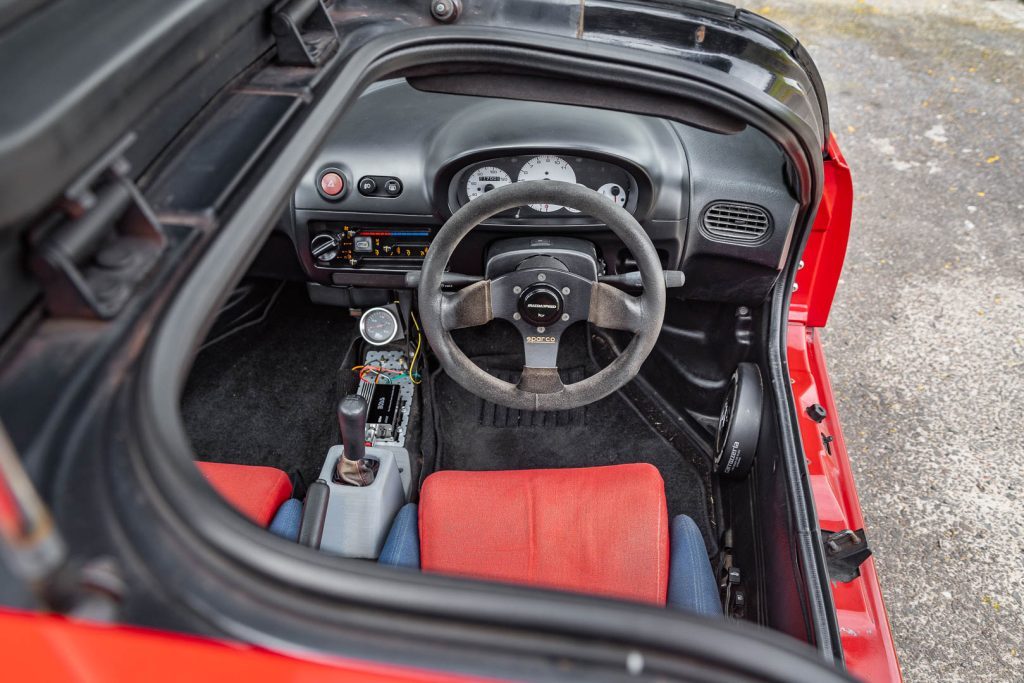 Autozam AZ-1 interior shot, showing Mazdaspeed steering wheel