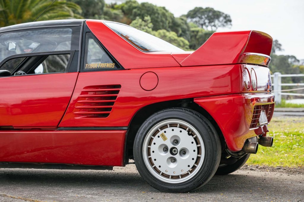 rear end of the Mazda Autozam AZ-1 1993, with Mazdaspeed exhausts