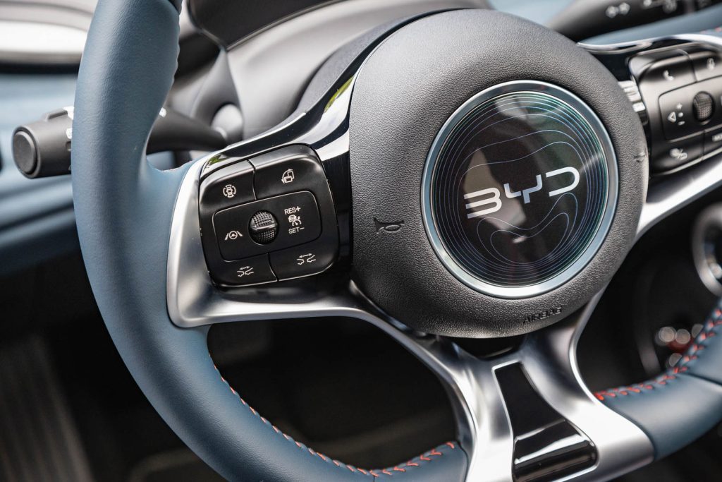 BYD Atto 3 steering wheel detail, with various buttons