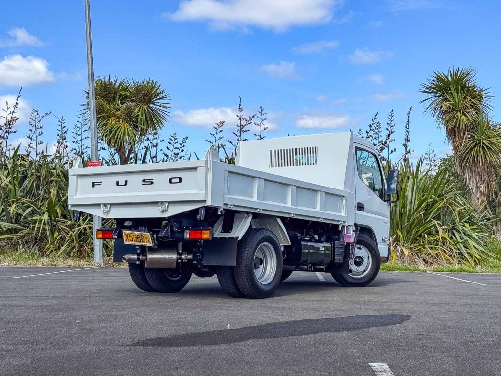 Rear quarter shot ofo the Fuso Canter 616T City Tipper, showing tray setup