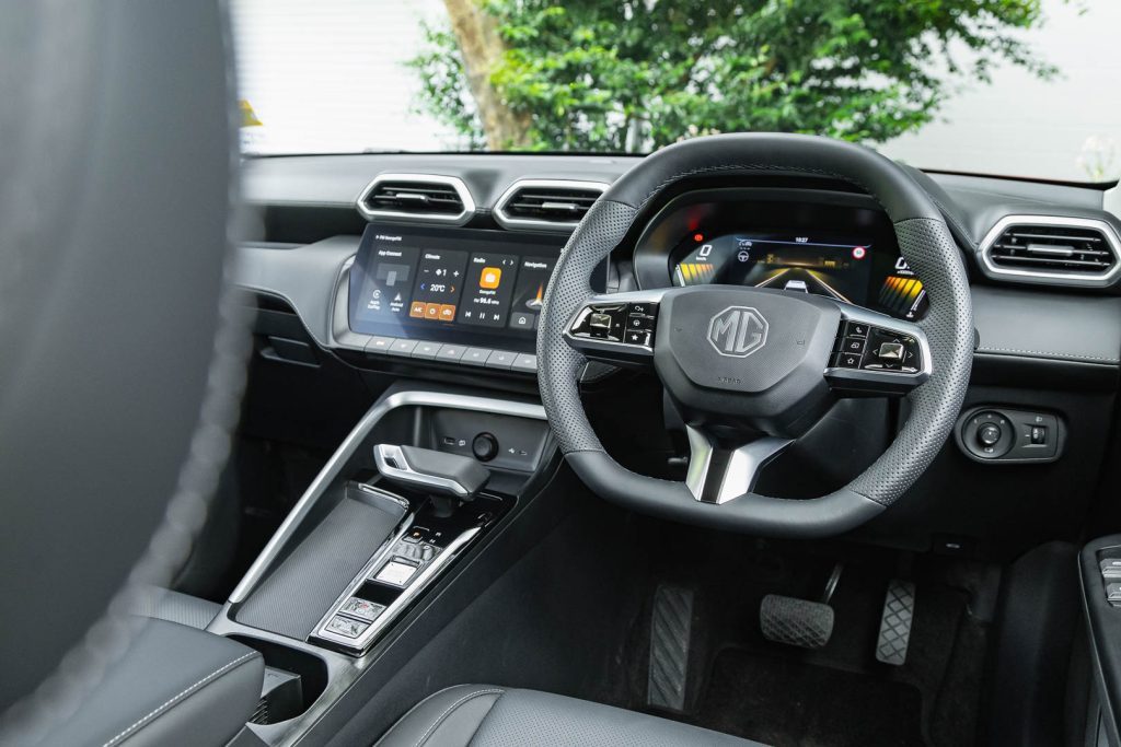 Front wide interior shot, showing infotainment, steering wheel, and dash layout, MG ZS second gen