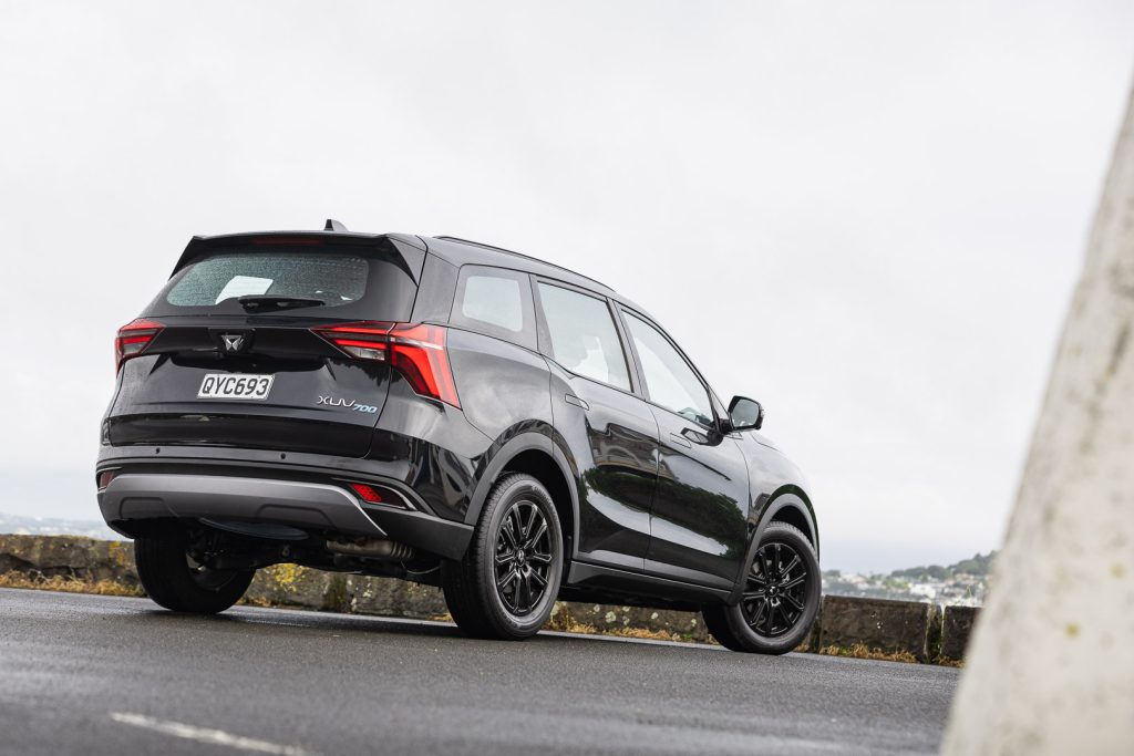 2024 Mahindra XUV600 AX7L rear view, shown from low down, pictured in black