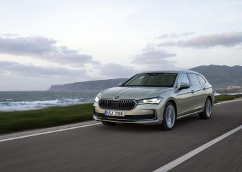 New Skoda Superb driving along the road