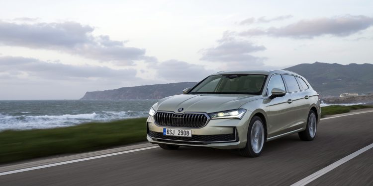 New Skoda Superb driving along the road