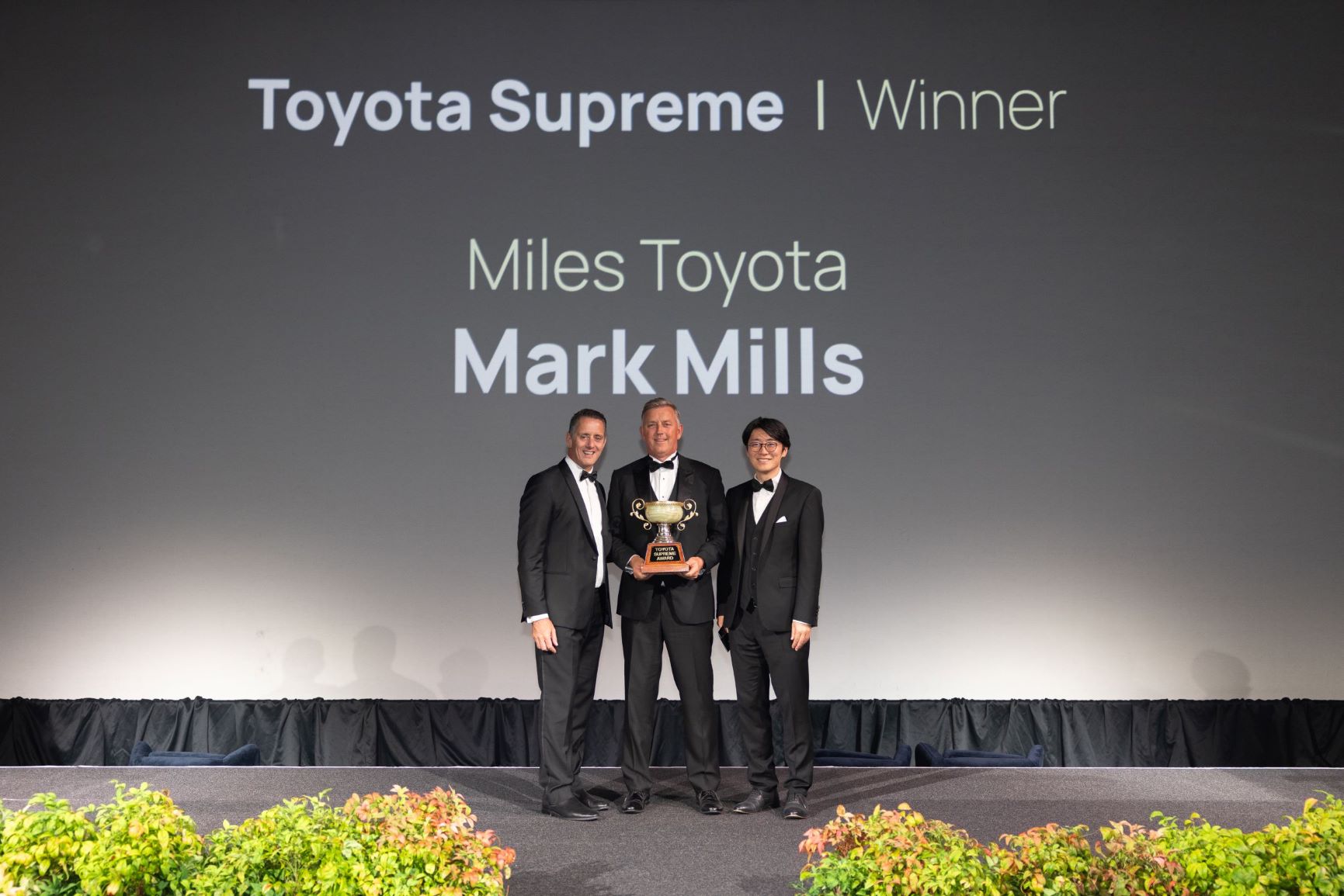 Mark Mills pictured here with TNZ’s Andrew Davis (left) and Acting CEO, Tatsuya Ishikawa (right).