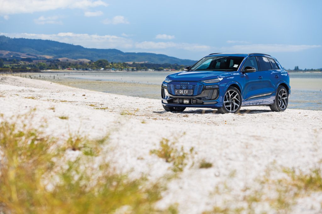 Audi Q6 e-tron S-Line parked on beach