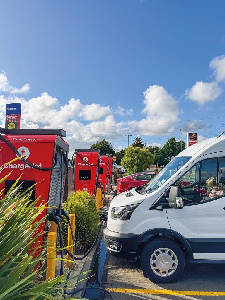 Ford eTransit van charging at a ChargeNet electric vehicle station