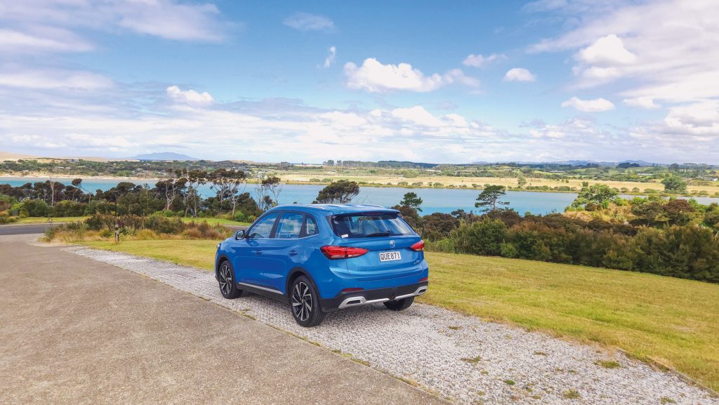 Rear shot of an MG ZS Hybrid+ Essence on a driveway, New Zealand.