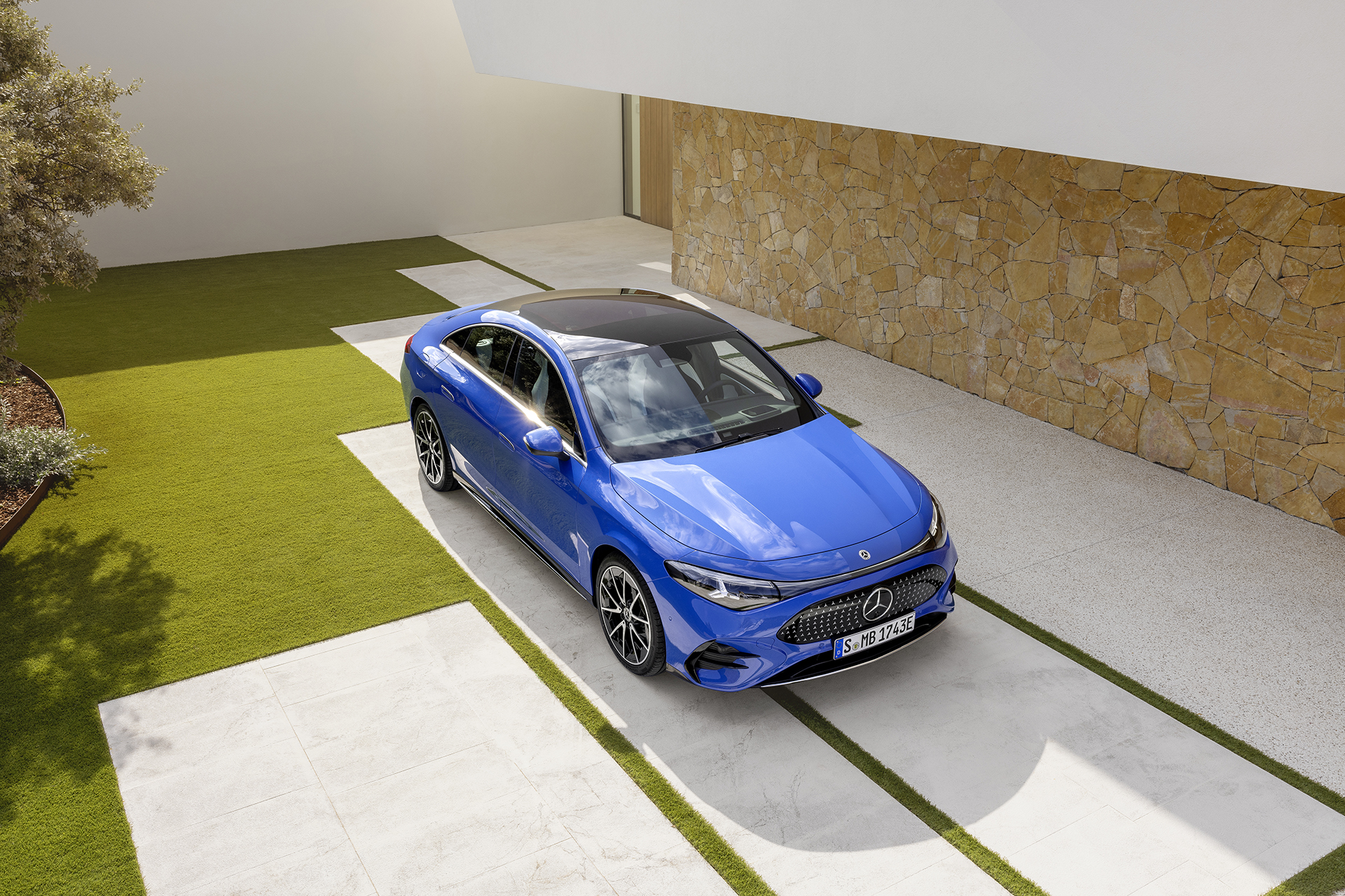 Mercedes-Benz CLA in blue on concrete pad